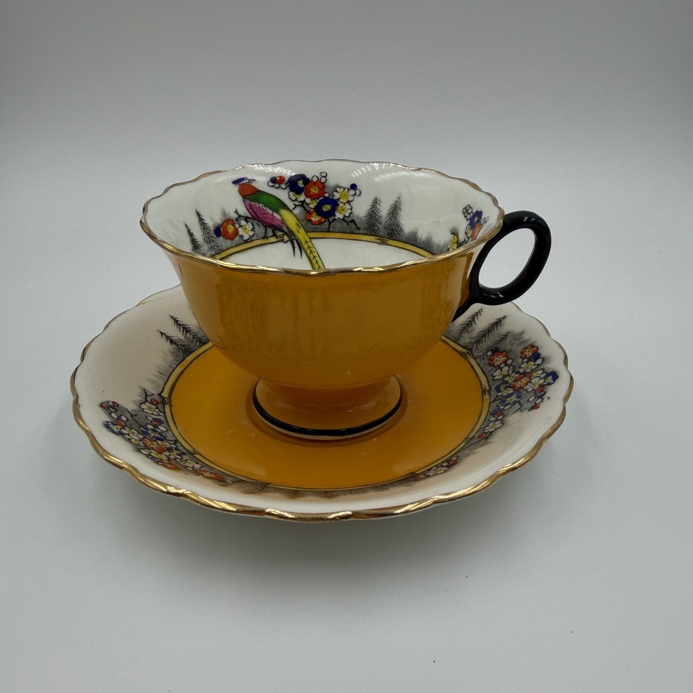 Grimwades Rideau Ware cup and saucer, Henry Birks & Sons, Pheasant, 1930s-1940s